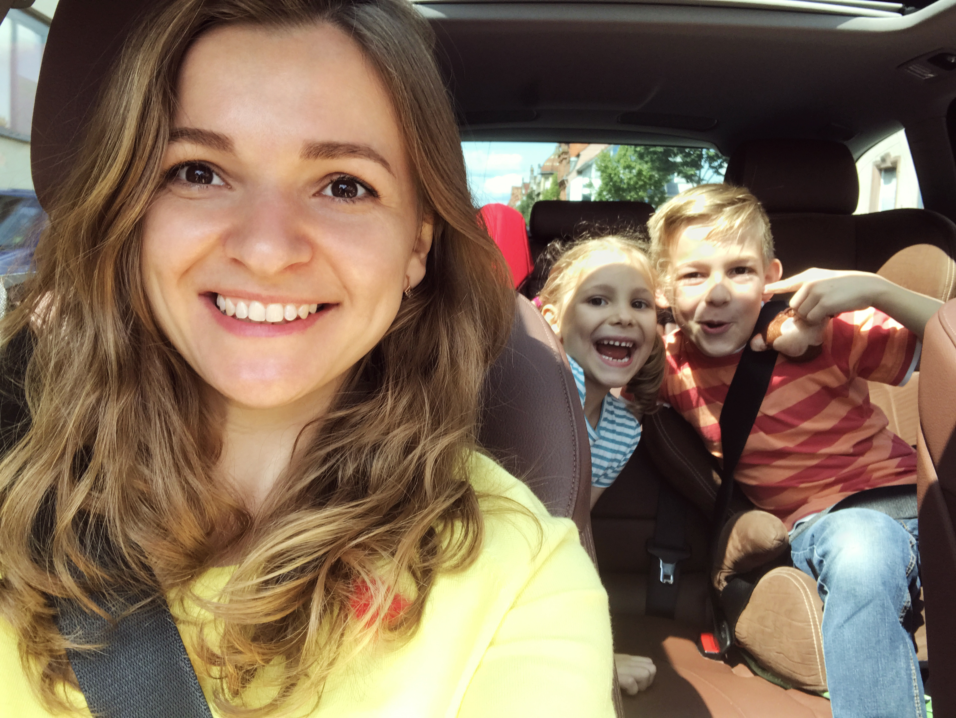 Mom with children in vehicle